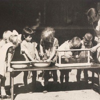 Cura degli animali, pulire un acquario Cleaning out the aquarium. Children's House at the Fröbelseminar in Hamburg, 1928 - T. Müller, R. Schneider, <em>Lehrmaterialien 1913-1935. Möbel und Architektur. Techning Meterials 1913-1935. Furniture and Architecture</em>, München, Prestel Verlag, 2002, p.85$$$436