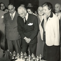 <p>[Maria de Unterrichter Jervolino, President of the Opera Nazionale Montessori, with Hon. Antonio Segni, Minister of Public Education, in the center, observing Anna Maria Maccheroni, a pupil of Maria Montessori, demonstrating the use of bells for musical education. National Montessori Congress, Naples, 1952] – ONM Archive.</p>$$$547