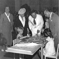 <p>[Maria Montessori in the center, with Hon. Maria de Unterrichter Jervolino, President of the Opera Nazionale Montessori, on the left, and Mario M. Montessori and Hon. Guido Gonella, Minister of Public Education, on the right. The names of the three pupils depicted are written on the back of the photograph: Maria Adele Groff, Fiorenza Groff, and Marinella Ferrari. International Montessori Congress on the theme <em>The Formation of Man in World Reconstruction</em>, Sanremo, 22–29 August 1949] – ONM Archive.</p>$$$550